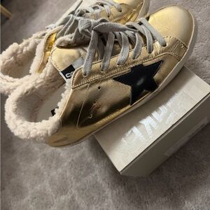 Golden goose women’s shearling sneakers